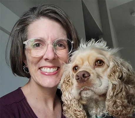 photo of a women with a dog